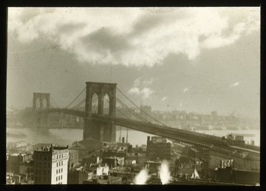 <em>"Views: U.S., Brooklyn. Brooklyn Bridge. View 020: Brooklyn Bridge; sunset."</em>. Lantern slide 3.25x4in, 3.25 x 4 in. Brooklyn Museum, CHART_2011. (S10_21_US_Brooklyn_Brooklyn_Bridge020.jpg