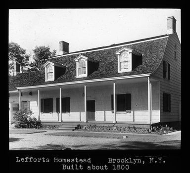 <em>"Views: U.S., Brooklyn. Brooklyn, Lefferts Homes. View 012: Lefferts homestead (the back porch)."</em>. Lantern slide 3.25x4in, 3.25 x 4 in. Brooklyn Museum, CHART_2011. (Photo: Edward Van Altena, S10_21_US_Brooklyn_Brooklyn_Lefferts_Homes012.jpg