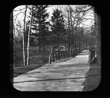 <em>"Views: U.S., Brooklyn. Brooklyn, Prospect Park. View 018: Rustic Bridge [Music Grove Bridge]."</em>. Lantern slide 3.25x4in, 3.25 x 4 in. Brooklyn Museum, CHART_2011. (Photo: Gould W. Hart, S10_21_US_Brooklyn_Brooklyn_Prospect_Park018.jpg