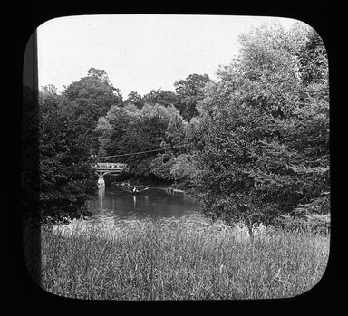 <em>"Views: U.S., Brooklyn. Brooklyn, Prospect Park. View 034: Row boats on a lagoon."</em>. Lantern slide 3.25x4in, 3.25 x 4 in. Brooklyn Museum, CHART_2011. (Photo: Gould W. Hart, S10_21_US_Brooklyn_Brooklyn_Prospect_Park034.jpg