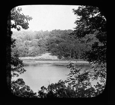 <em>"Views: U.S., Brooklyn. Brooklyn, Prospect Park. View 043: View of the lake."</em>. Lantern slide 3.25x4in, 3.25 x 4 in. Brooklyn Museum, CHART_2011. (Photo: Gould W. Hart, S10_21_US_Brooklyn_Brooklyn_Prospect_Park043.jpg