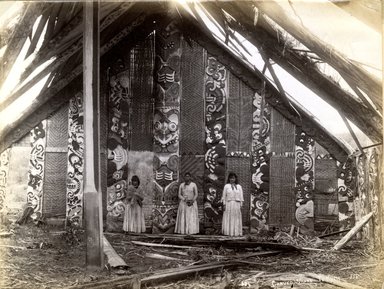 <em>"Three Maori women standing in dilapitated meeting house."</em>, 1883. Bw photographic print, 5 x 7 in (13 x 16 cm). Brooklyn Museum. (Photo: Brooklyn Museum, TR680_N42_Maori_TL1986.450.29_SL4.jpg