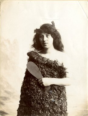 <em>"Portrait of Maori woman holding mock club."</em>, 1883. Bw photographic print, 5 x 7 in (13 x 16 cm). Brooklyn Museum. (Photo: Brooklyn Museum, TR680_N42_Maori_TL1986.450.32_SL4.jpg