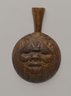 Spoon with Face of Bes or another Birth God