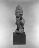 Kneeling Figure Blowing Whistle