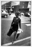 Untitled (Woman with Purse and Portfolio Crossing the Street), from Women are Beautiful Series