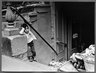 Lower East Side N.Y.C (Child on Stairs with Bananas and Potatoes)