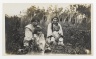 [Untitled] (Two Women with Children Sitting in a Field)