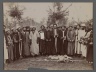 A Group of Religious Men in Religious Garb  holding up a Piece of Calligraphy, One of 274 Vintage Photographs