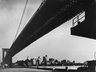 New York Harbor, Brooklyn Bridge Spanning the East River as Seen from Pier on Manhattan Side, November 1946