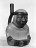 Stirrup Spout Vessel in Form of Seated Figure