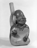 Stirrup Spout Vessel in Form of a Seated Figure