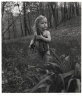 [Untitled] (Little Girl with Doll in Woods)