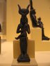 Small Bronze Statuette of Isis Holding Horus