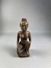 Seated Female Figurine