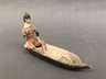 Figurine Seated in Canoe with Turtle