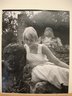 Swedish Model (Blonde Woman in White Dress Leaning Against Statue of a Head)