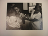 [Untitled] (Maude Callen Giving Shot to Woman Holding Little Girl)