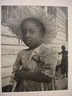 [Untitled] (Child with Straw Hat and Crutches)