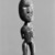 Maori. <em>Gable Finial  (Tekoteko)</em>, ca. 1900. Wood, pāua shell, 16 15/16 x 3 3/8 x 2 3/8 in.  (43.0 x 8.5 x 6.0 cm). Brooklyn Museum, Purchased with funds given by A. Augustus Healy, Carll de Silver and Robert B. Woodward, 03.324.2787. Creative Commons-BY (Photo: , 03.324.2787_overall_acetate_bw.jpg)