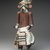 She-we-na (Zuni Pueblo). <em>Kachina Doll (Kja-kja-lih)</em>, late 19th century. Wood, feather, cotton, pigment, wool yarn, plant fiber, 14 15/16 x 4 13/16 x 4 3/16 in. (37.9 x 12.2 x 10.6 cm). Brooklyn Museum, Museum Expedition 1907, Museum Collection Fund, 07.467.8425. Creative Commons-BY (Photo: Brooklyn Museum, 07.467.8425.jpg)