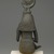  <em>Seated Statuette of Isis Holding Horus</em>, 332 B.C.E.-30 B.C.E. Bronze, 14 1/2 × 3 3/4 × 4 1/4 in. (36.8 × 9.5 × 10.8 cm). Brooklyn Museum, Museum Collection Fund, 11.682. Creative Commons-BY (Photo: Brooklyn Museum, 11.682_back_edited_PS2.jpg)