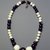 Ainu. <em>Necklace</em>. Porcelain beads, 1 3/4 x 34 5/8 in. (4.5 x 88 cm). Brooklyn Museum, Gift of Herman Stutzer, 12.450. Creative Commons-BY (Photo: Brooklyn Museum, 12.450.jpg)