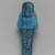  <em>Shabty of Nesi-ta-nebet-Isheru, Daughter of Pinedjem II</em>, ca. 1075-945 B.C.E. Faience, 5 13/16 x 2 1/4 x 1 1/2 in. (14.7 x 5.7 x 3.8 cm). Brooklyn Museum, Gift of Evangeline Wilbour Blashfield, Theodora Wilbour, and Victor Wilbour honoring the wishes of their mother, Charlotte Beebe Wilbour, as a memorial to their father, Charles Edwin Wilbour, 16.183. Creative Commons-BY (Photo: Brooklyn Museum, 16.183_back_PS2.jpg)