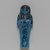  <em>Shabty of Queen Henuttawy</em>, ca. 1075-945 B.C.E. Faience, 4 3/4 x 1 3/4 x 1 in. (12.1 x 4.4 x 2.5 cm). Brooklyn Museum, Gift of Evangeline Wilbour Blashfield, Theodora Wilbour, and Victor Wilbour honoring the wishes of their mother, Charlotte Beebe Wilbour, as a memorial to their father, Charles Edwin Wilbour, 16.188. Creative Commons-BY (Photo: Brooklyn Museum, 16.188_front_PS2.jpg)