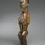 Master of Mayama. <em>Figure of Standing Male (Nkisi)</em>, late 19th century. Wood, shell, mud, metal, resin, organic materials, imported buttons, 25 1/2 x 4 1/4 x 4 3/4 in. (64.8 x 10.8 x 12.1 cm). Brooklyn Museum, The Adolph and Esther D. Gottlieb Collection, 1989.51.19. Creative Commons-BY (Photo: Brooklyn Museum, 1989.51.19_PS2.jpg)