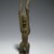 Dogon. <em>Nommo Figure with Raised Arms</em>, 11th-15th century (possibly). Wood, organic sacrificial materials, 10 1/2 x 2 7/8 x 1 3/4 in. (26.7 x 7.3 x 4.4 cm). Brooklyn Museum, The Adolph and Esther D. Gottlieb Collection, 1989.51.39. Creative Commons-BY (Photo: Brooklyn Museum, 1989.51.39_PS6.jpg)