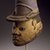 Yorùbá. <em>Gelede Helmet Mask of a Gendarme</em>, early 20th century. Wood, metal, pigment, 10 x 7 x 11 in. (25.4 x 17.8 x 27.9 cm). Brooklyn Museum, Gift of Eugene and Harriet Becker, 1991.226.3. Creative Commons-BY (Photo: Brooklyn Museum, 1991.226.3_SL3.jpg)
