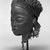 Chokwe. <em>Mask (Mwana Pwo)</em>, early 20th century. Wood, fiber, metal, 12 x 8 1/2 x 9 in. (30.5 x 21.5 x 22.7 cm). Brooklyn Museum, Gift of Corice and Armand P. Arman, 1992.133.3. Creative Commons-BY (Photo: Brooklyn Museum, 1992.133.3_view2_bw.jpg)