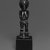 Attie. <em>Standing Female Figure</em>, early 20th century. Wood, metal, string, glass, 7 x 1 1/4 in.  (17.8 x 3.2 cm). Brooklyn Museum, Gift of Drs. Noble and Jean Endicott, 1992.136.5. Creative Commons-BY (Photo: Brooklyn Museum, 1992.136.5_view2_bw.jpg)