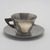 Marion Anderson Noyes (American, 1907-2002). <em>Cup and Saucer</em>, 20th century. Pewter, walnut, (a) Cup: 1 7/8 x 3 1/4 x 2 9/16 x 2 9/16 in. (4.8 x 8.3 x 6.5 x 6.5 cm). Brooklyn Museum, Gift of Marion Anderson Noyes, 1992.40.13a-b. Creative Commons-BY (Photo: Brooklyn Museum, 1992.40.13a-b.jpg)