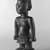 Yorùbá artist. <em>Male twin figure (Ère Ìbejì)</em>, early 20th century. Wood, glass beads, nails, 8 x 2 1/2in. (20.3 x 6.4cm). Brooklyn Museum, Gift of the David and Margery Edwards Collection, 1992.67.2. Creative Commons-BY (Photo: Brooklyn Museum, 1992.67.2_bw.jpg)