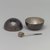 Napier (1922-present). <em>Salt and Pepper Server</em>, ca. 1935. Silver-plated brass, (a & b) Bowl & Shaker fitted together: 1 7/8 x 2 x 2 in. (4.8 x 5.1 x 5.1 cm). Brooklyn Museum, Gift of Mark Isaacson, 1992.92.6a-c. Creative Commons-BY (Photo: Brooklyn Museum, 1992.92.6a-c_bt_open.jpg)