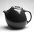 Ben Seibel (American, 1918-1985). <em>Teapot from Raymor Modern Stoneware line</em>, ca. 1952. Glazed earthenware, 7 x 10 x 6 in. (17.8 x 25.4 x 15.2 cm). Brooklyn Museum, Gift of Rosemarie Haag Bletter and Martin Filler, 1994.112.1a-b. Creative Commons-BY (Photo: Brooklyn Museum, 1994.112.1a-b_bw.jpg)