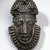 Edo. <em>Hip Ornament with Human Face (Uhunmwu-Ẹkuẹ)</em>, 18th century (possibly). Copper alloy, iron, 6 13/16 × 4 5/16 × 2 1/4 in. (17.3 × 11 × 5.7 cm). Brooklyn Museum, Gift of Beatrice Riese, 1994.143. Creative Commons-BY (Photo: Brooklyn Museum, 1994.143_SL1.jpg)