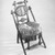 George Jacob Hunzinger (American, born Germany, 1835-1898). <em>Chair</em>, ca. 1869. Ebonized wood, original upholstery, 33 1/2 x 19 3/4 x 22 5/8 in.  (85.1 x 50.2 x 57.5 cm). Brooklyn Museum, Gift of Norman Mizuno, 1994.164. Creative Commons-BY (Photo: Brooklyn Museum, 1994.164_view2_bw_IMLS.jpg)