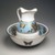 Minton and Company (1849-1878). <em>Pitcher and Basin</em>, ca. 1870. Glazed porcelain, Pitcher: height 11 1/4 in (28.6 cm) width 8 1/4in. (21 cm) diameter 7 1/2 in. (19 cm) Basin: height 4 5/8 in. (11.9 cm) diameter 14 3/4in. (37.5 cm). Brooklyn Museum, Bequest of Marie Bernice Bitzer, by exchange, 1995.58.1a-b. Creative Commons-BY (Photo: Brooklyn Museum, 1995.58.1a-b_transp629.jpg)