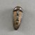 Kpelle. <em>Personal Miniature Mask</em>, 20th century. Wood, 2 7/8 x 1 1/4 x 1 1/8in. (7.3 x 3.2 x 2.9cm). Brooklyn Museum, Gift of Blake Robinson, 1995.7.36. Creative Commons-BY (Photo: Brooklyn Museum, 1995.7.36_front_PS5.jpg)
