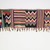 Kirdi. <em>Pubic Apron</em>, mid-20th century. Glass beads, cotton, cowrie shells, 6 1/2 x 17 1/2 in.  (16.5 x 44.5 cm). Brooklyn Museum, Gift of Mark S. Rapoport, M.D. and Jane C. Hughes, 2000.69.13. Creative Commons-BY (Photo: Brooklyn Museum, 2000.69.13_transp6038.jpg)