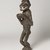 Baule. <em>Figure of a Monkey, possibly for Mbra</em>, late 19th or early 20th century. Wood, pigment, sacrificial material, 22 x 5 1/4 x 7 3/4 in.  (55.9 x 13.3 x 19.7 cm). Brooklyn Museum, Carll H. de Silver Fund, 2001.48. Creative Commons-BY (Photo: , 2001.48_threequarter_PS9.jpg)