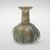 Roman. <em>Bottle</em>. Glass, 2 1/2 x 2 in. (6.4 x 5.1 cm). Brooklyn Museum, Gift of Dr. Alvin E. Friedman-Kien, 2002.119.23. Creative Commons-BY (Photo: Brooklyn Museum, 2002.119.23_view2_PS11.jpg)