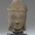  <em>Crowned Bodhisattva Head</em>, 12th century. Grey stone, 11 x 5 x 5 1/2 in. (28 x 12.7 x 14 cm). Brooklyn Museum, Gift of the Doris Duke Foundation, 2003.64.4. Creative Commons-BY (Photo: Brooklyn Museum, 2003.64.4_front_PS1.jpg)