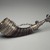Mende. <em>Horn and Silver Pendant</em>, 19th century. Cow horn, silver, aluminum, 10 1/4 x 3 x 2 1/2 in. (26 x 7.6 x 6.4 cm). Brooklyn Museum, Gift of Blake Robinson, 2004.76.1. Creative Commons-BY (Photo: Brooklyn Museum, 2004.76.1.jpg)