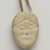 Therese Ukaleannuk (Inuit). <em>Janus-faced Amulet Head, March 1974</em>, 1950-1980. Tan stone, 2 x 1/2 x 3/4 in. (5.1 x 1.3 x 1.9 cm). Brooklyn Museum, Hilda and Al Schein Collection, 2004.79.28. Creative Commons-BY (Photo: Brooklyn Museum, 2004.79.28_PS11-1.jpg)