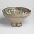  <em>Bowl with Twelve-Pointed Central Star</em>, 19th century. Earthenware with green, yellow, blue, brown and white glazes, Diam: 11 3/4 in. (29.8 cm); H. 5 in. Brooklyn Museum, Gift of Dr. Charles S. Grippi in honor of the memory of the late Professor Virgil H. Bird, 2004.83.2. Creative Commons-BY (Photo: Brooklyn Museum, 2004.83.2_side.jpg)