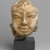  <em>Head of a Bodhisattva</em>, 8th-9th century. Stucco with white wash, 5 3/4 in. (14.6 cm). Brooklyn Museum, Gift of Dr. Bertram H. Schaffner, 2004.86.1. Creative Commons-BY (Photo: Brooklyn Museum, 2004.86.1_front_PS1.jpg)